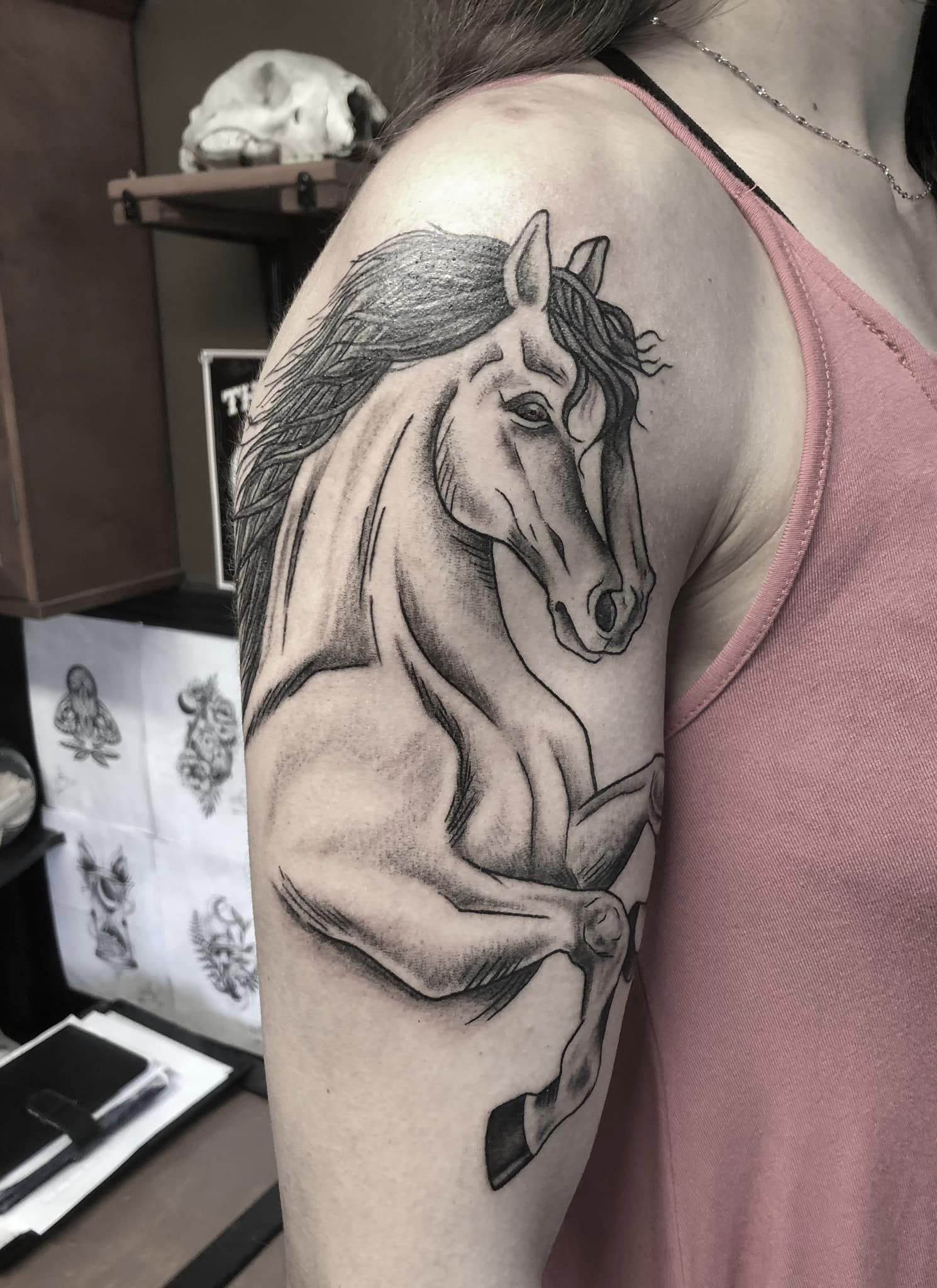 Cheval tribal tattoo